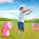 Jucarie Interactiva pentru Baloane de Sapun,  Sunete si Lumini, Model Dinozaur, cu 8 Orificii, 15 x 8.5 x 18.5, Roz